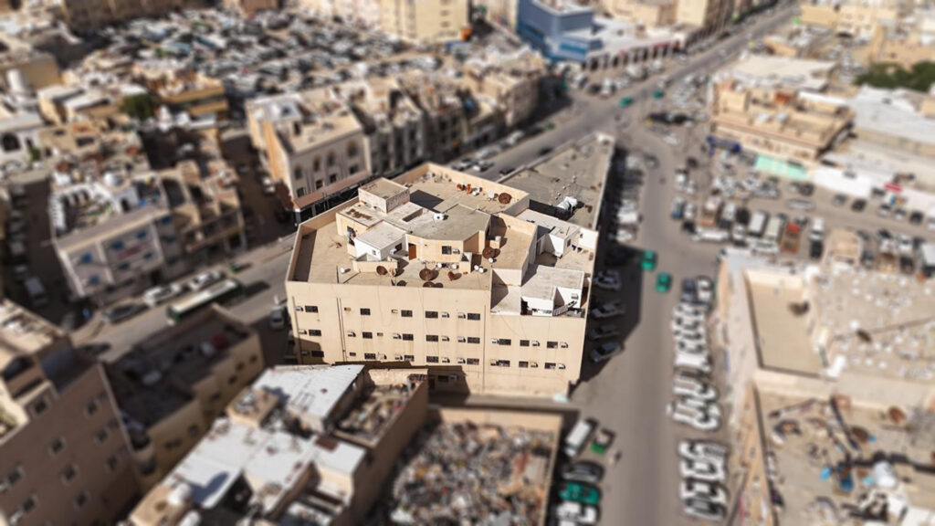 1-عمارة تجارية / سكنية في حي الشميسي