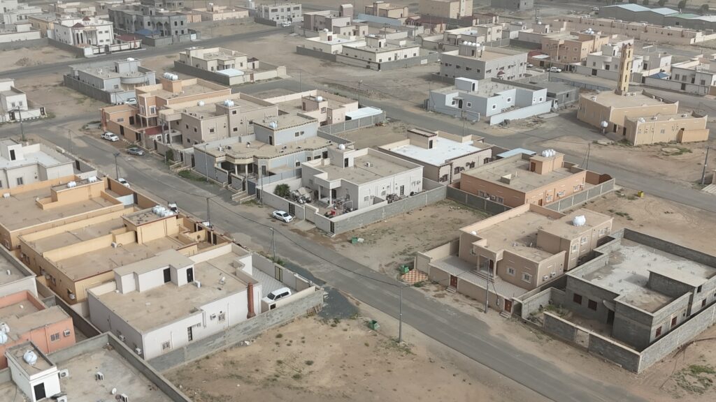11-أرض سكنية 600م2 بحي التعاون ا