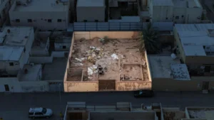 2-أرض سكنية مسورة 525م2 بحي أحد